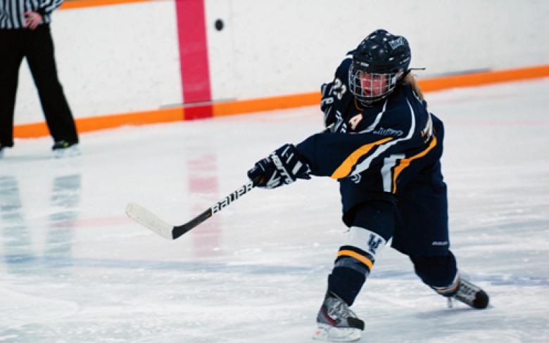 Veteran defenseman Glenda Edie fires a shot on net during Canada West action at Nicholas Sheran Arena.