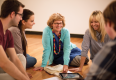 Leanne Elias (L) with a group, including graduate student Christine Clark (R).